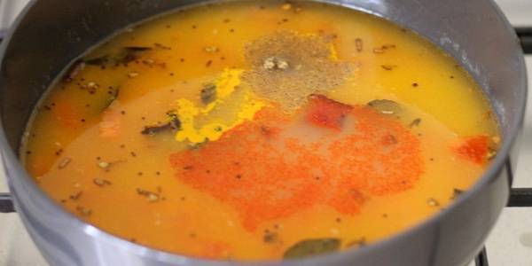 Dal Dhokli Recipe for dal adding masala