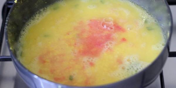 sindhi moong dal recipe adding tomato puree