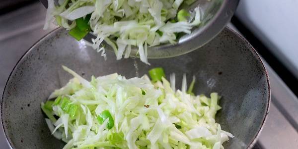 Gujarati Cabbage Sambharo Recipe now adding the cabbage