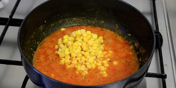sweet corn masala curry adding boiled corn