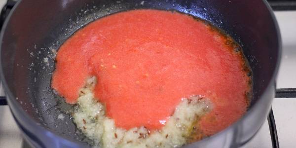 Corn Palak Sabji adding tomato paste