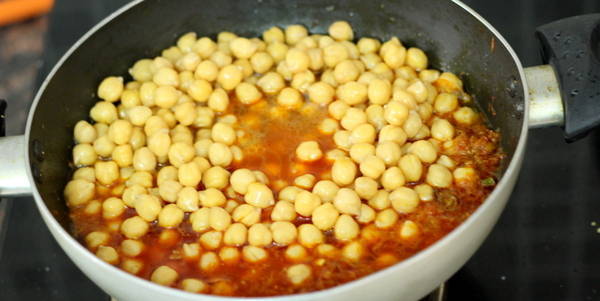Chole Paneer Masala Recipe adding boiled chole