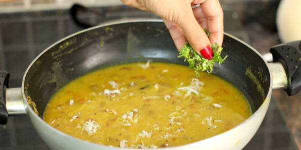 Gujarati Dal Recipe adding corinder leaves