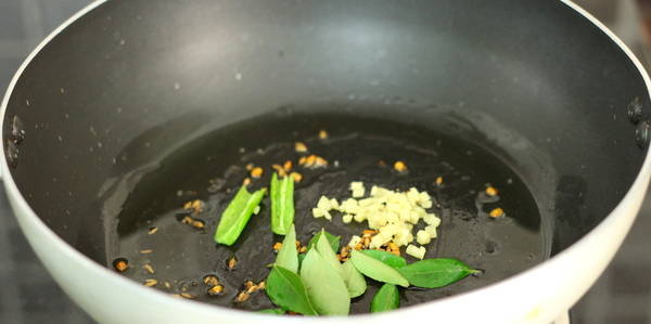 Gujarati Dal Recipe  adding green chili and ginger
