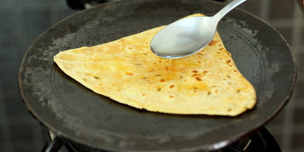 Jeera Paratha Recipe adding oil