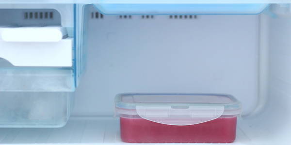 Pomegranate Orange juice placing in fridge