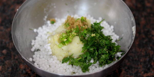 Sabudana Pakoda Recipe adding masala