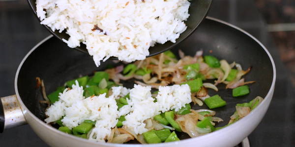 capsicum pulao adding boiled rice