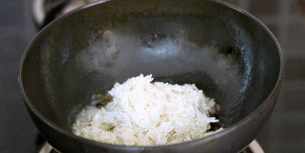 capsicum pulao making rice adding soaked rice