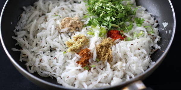 Mooli Paratha adding indian spices