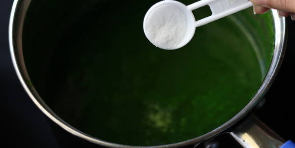 Palak Corn Soup adding salt