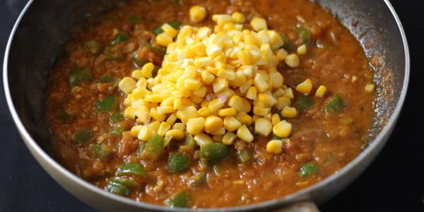 corn capsicum masala adding boiled corn