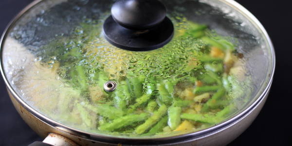 gawar aloo sabzi  close the lid and cook