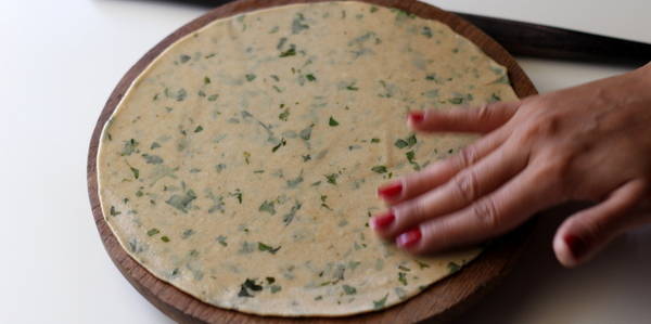 pudina paratha recipe step smearing oil ghee