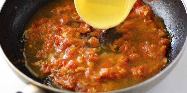 tomato peanut curry  adding water