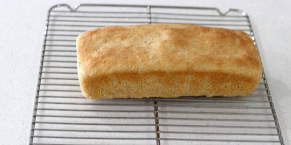 eggless whole wheat bread loaf out of the mould